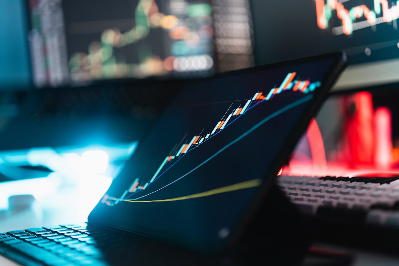 Tablet displaying cryptocurrency growth chart in a digital workspace.